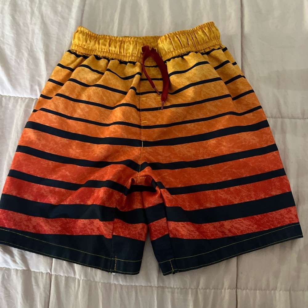 A pair of boys swimming shorts size 7